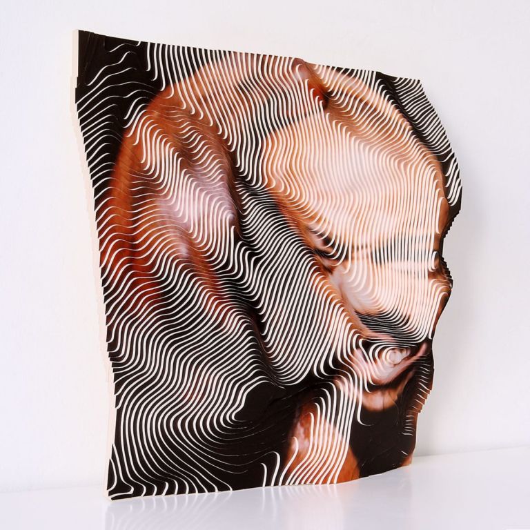 Photographic contour sculpture of bodybuilder Dexter Jackson's contorted face, lateral view