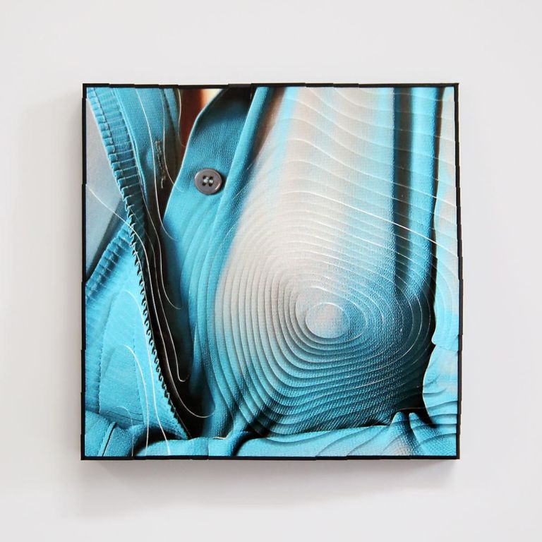 Photographic contour sculpture of a female breast in turquoise chiffon blouse